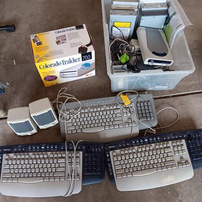 Assortment of computer keyboards and drives and other Computer accessories
