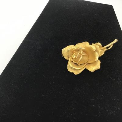 Gold toned rose brooch