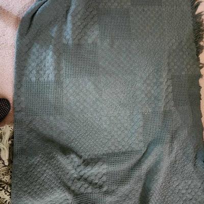 Pair of green throw blankets
