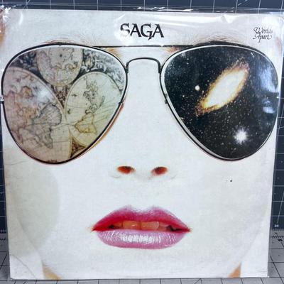 SAGA; WORLDS APART
