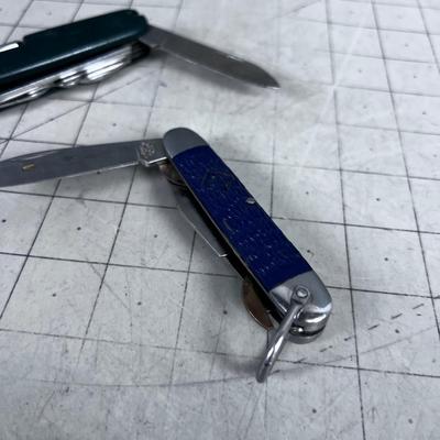 Swiss Army Knife and a Cub Scout Knife