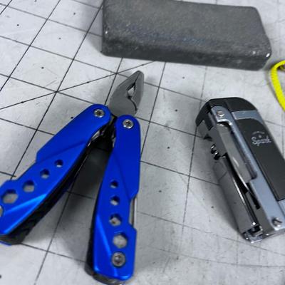 Sharpening Stone, Lighter, Leatherman Plyers etc.