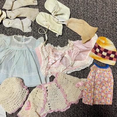 Small doll size clothing dresses, socks shoes, hats, sweater, etc
