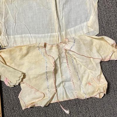 Lot of antique vintage baby doll clothes
