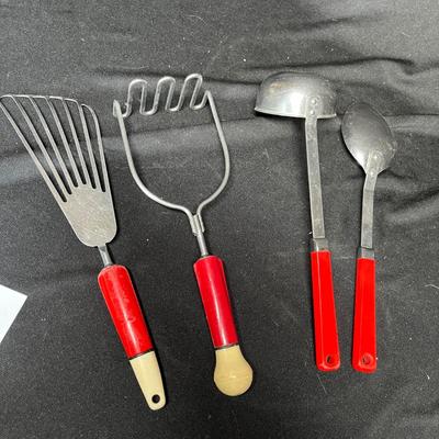 Vintage red handled utensils