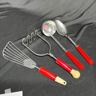Vintage red handled utensils
