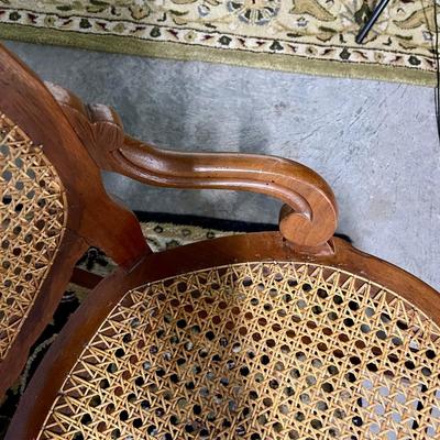 Carved and caned rocking chair