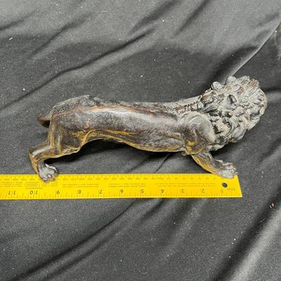 Cast metal lion