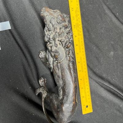 Cast metal lion