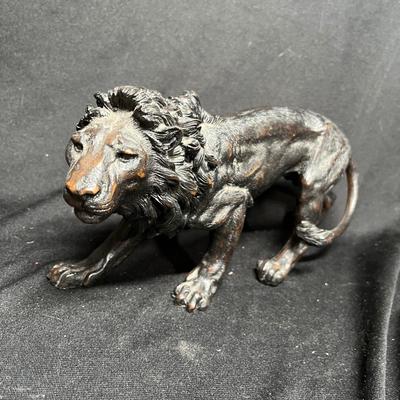 Cast metal lion