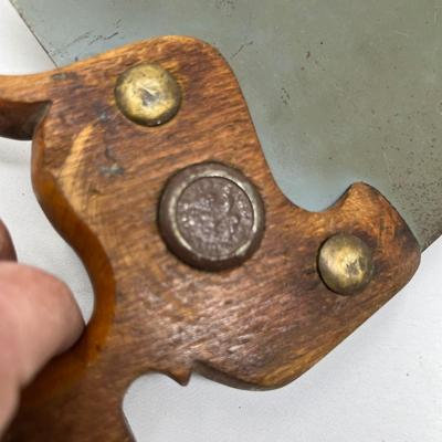 Antique saw with scene painted