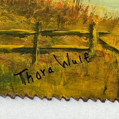 Antique saw with scene painted
