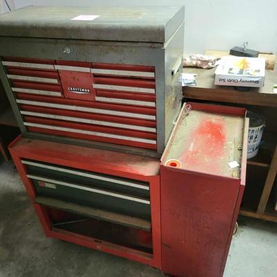 Grey and red Craftmans tool box with contents