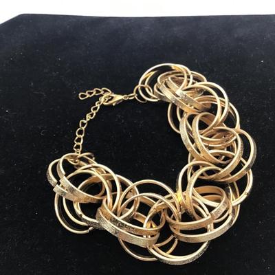 Gold toned linked bracelet