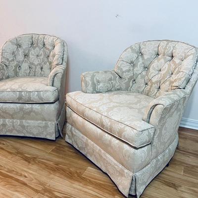 Two Swivel Rocking Chairs