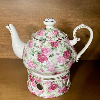 Pink teapot with warmer