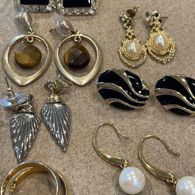 11 pairs of vintage gold tone earrings