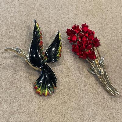 Gerry’s bird of paradise brooch and flower brooch