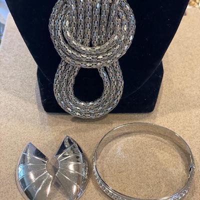 Large silver tone necklace, earrings and bracelet