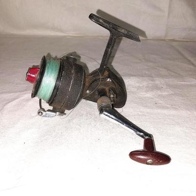 MITCHELL AND DAM QUICK FISHING REELS AND POLE HOLDERS