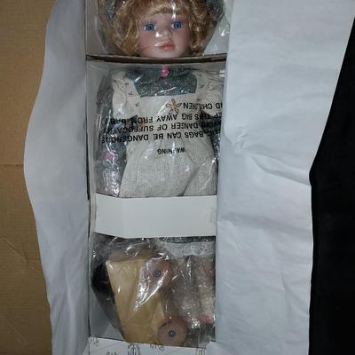 PORCELAIN DOLLWITH CERTIFICATE OF AUTHENTICITY