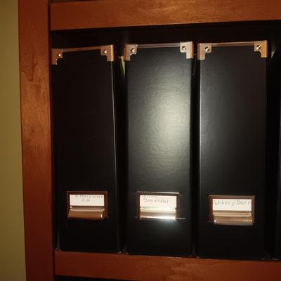 MAGAZINE HOLDERS FILLED WITH VARIOUS MAGAZINES