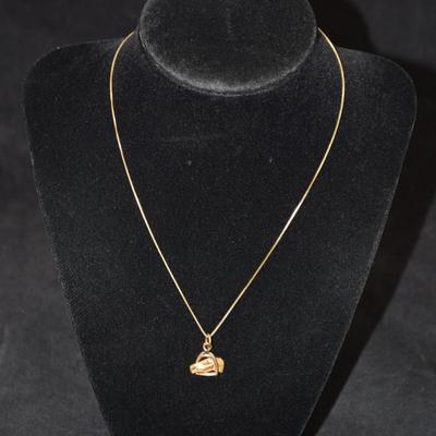 Sale Photo Thumbnail #67: In good condition, no flaws to note. Pendant has no hallmark, and the chain is stamped 14k.