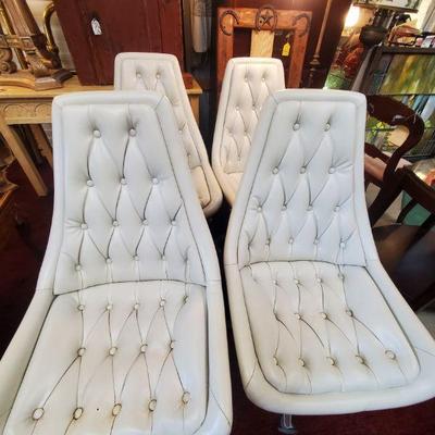 1969 MCM white leather swivel chairs 