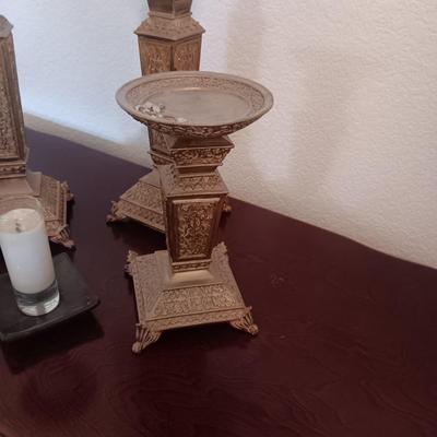 3 MATCHING CANDLE HOLDERS AND A SMALL CANDLE IN GLASS