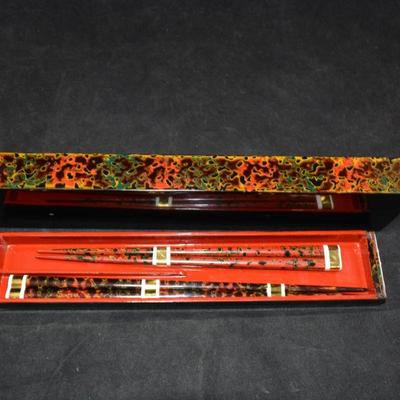 Lacquered Box with 2 Sets of Chop Sticks 10.75”x2.25”x1.25”
