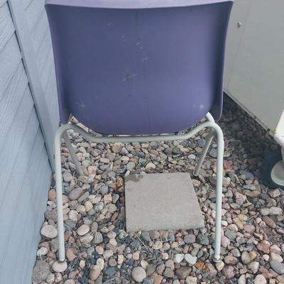 FOUR STACKABLE PURPLE CHAIRS
