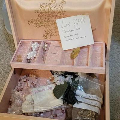 Vintage soft pink jewelry box with contents