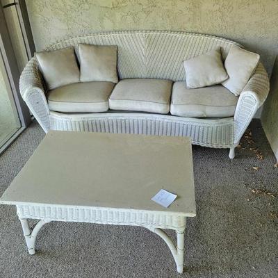 White wicker sofa and coffee table set