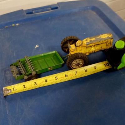 LOT 94 OLD METAL TOY TRACTOR AND MANURE SPREDER