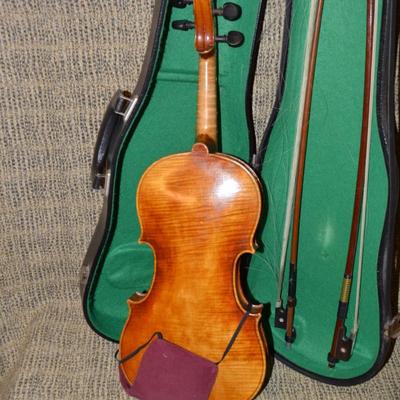 Sale Photo Thumbnail #700: Made in West Germany. Needs strings, but includes extra bridge and 2 bows. Case has some damage. 23.5"
