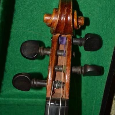 Sale Photo Thumbnail #696: Made in West Germany. Needs strings, but includes extra bridge and 2 bows. Case has some damage. 23.5"