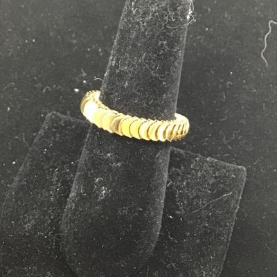Adjustable gold toned stretchy ring