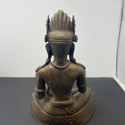 Antique Thai Gilt bronze seated Buddha figurine.