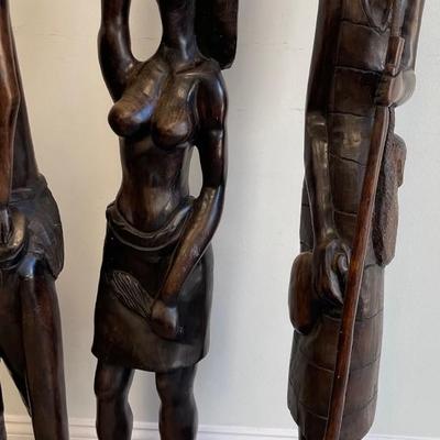 Three Tall Robust Wood African Statues