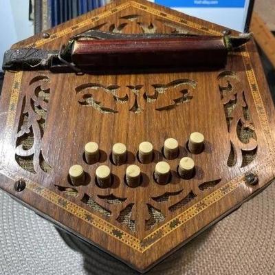 Vintage Antique Made in Germany Hand Cut Wooden Accordion Instrument w/20 Buttons. 1-Missing Button and Needs 2 New Leather Bands.