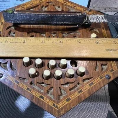 Vintage Antique Made in Germany Hand Cut Wooden Accordion Instrument w/20 Buttons. 1-Missing Button and Needs 2 New Leather Bands.