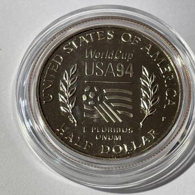 1994-P PROOF WORLD CUP SOCCER HALF DOLLAR IN A MINT HOLDER AS PICTURED.