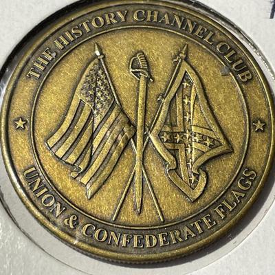 The History Channel Union & Confederate Flag Medal (Ike Dollar Size) in Good Preowned Condition.
