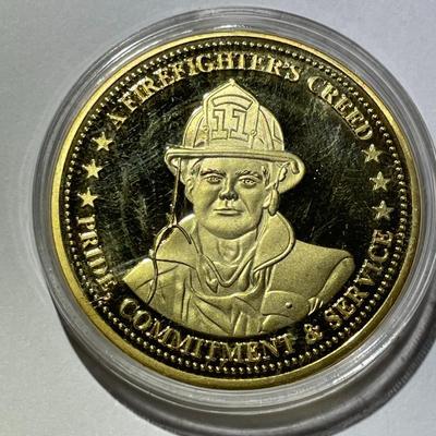 A Firefighter's Creed Commemorative Coin Encircled by the creed 