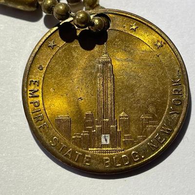 Vintage New York Empire State Building / Statue of Liberty Brass Keychain in Good Condition.