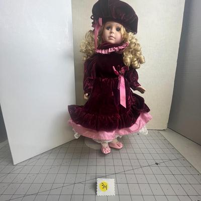 Porcelain Doll in Velvety Dress