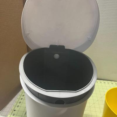 Sterilite White Plastic And small yellow Trash Can Bin