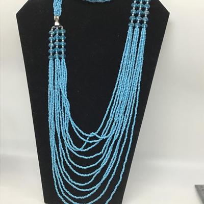 Long turquoise beaded necklace statement