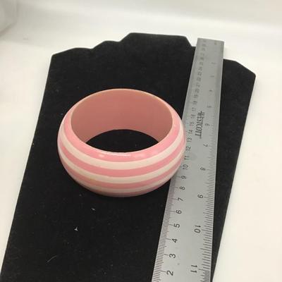 Pink and white striped bracelet
