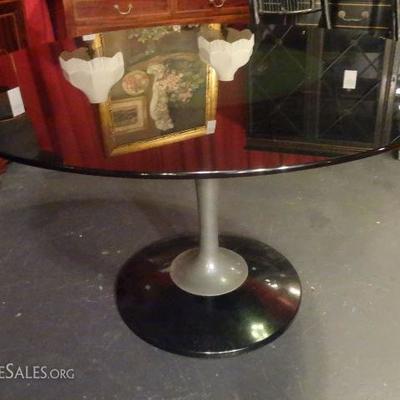 LOT 96E: MID CENTURY BLACK GLASS DINING TABLE, TULIP STYLE METAL BASE